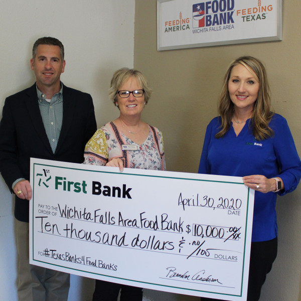 First Bank Donates Thousands to Local Food Bank