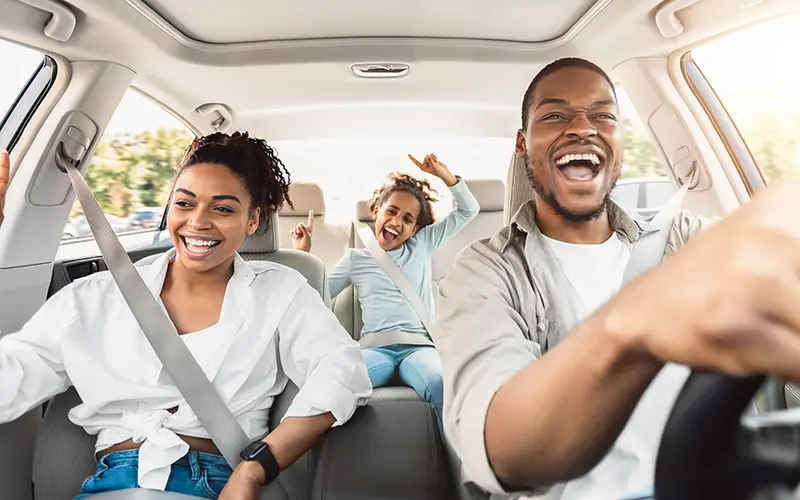 family in car